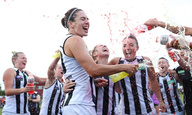 0310_AFLWREPORT_620.jpg Ash Brazill, Georgie Parker and Kristy Stratton celebrate their first victory of their Collingwood careers. (Image; AFL Photos) - Collingwood,Collingwood Magpies,AFLW